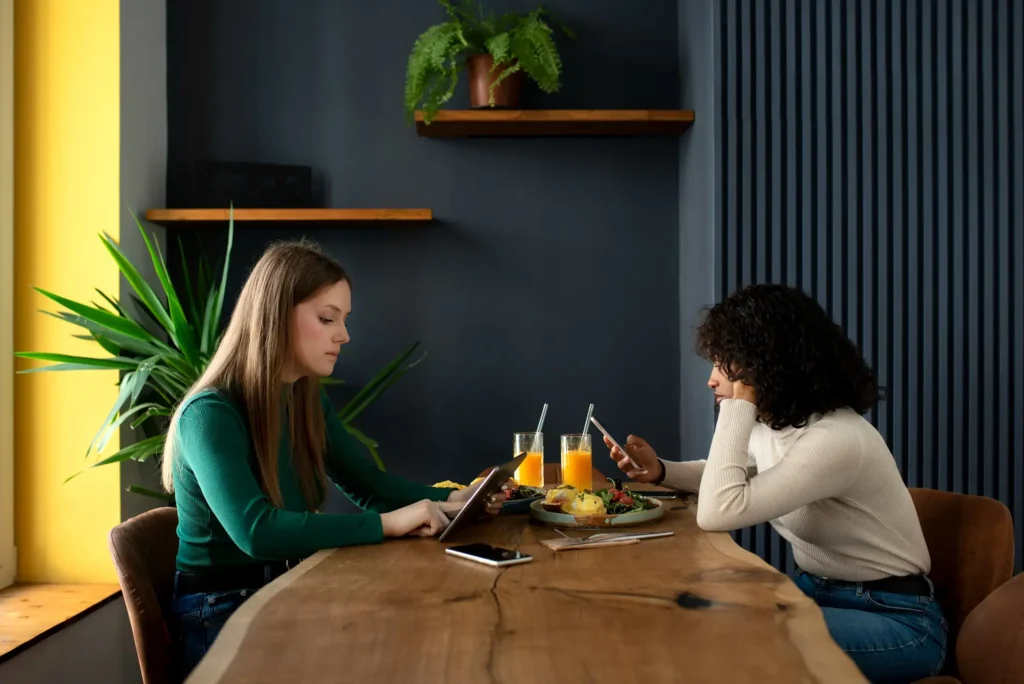 Creating quiet in noisy world shared silence with friends at café