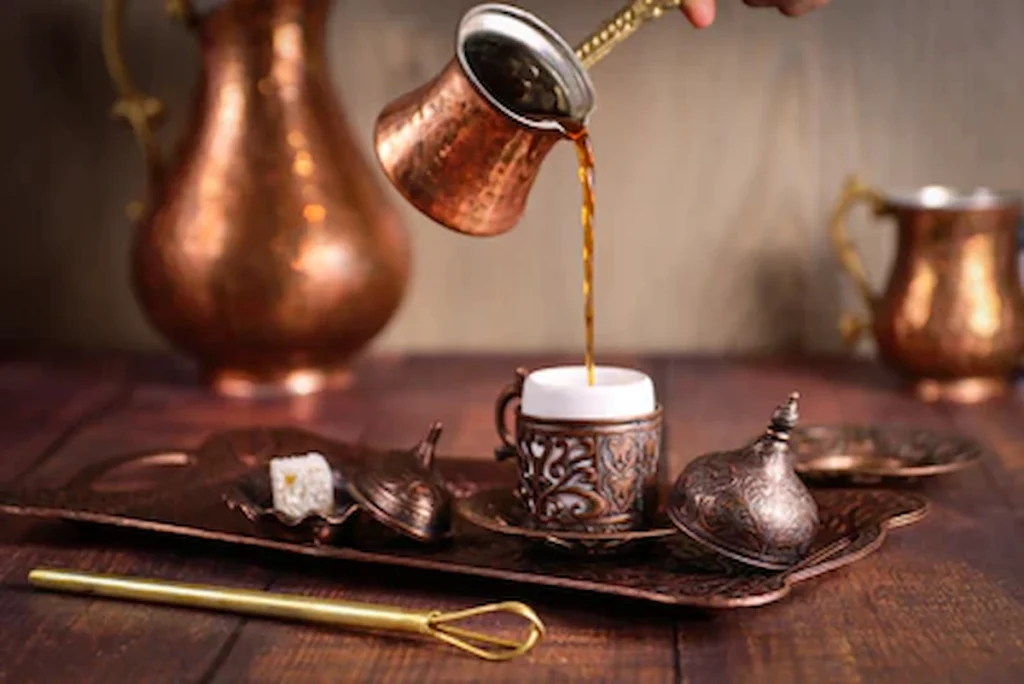 A vintage coffee advertisement alongside a modern specialty pour-over setup, symbolizing coffee’s transformation from instant brews to third-wave culture.