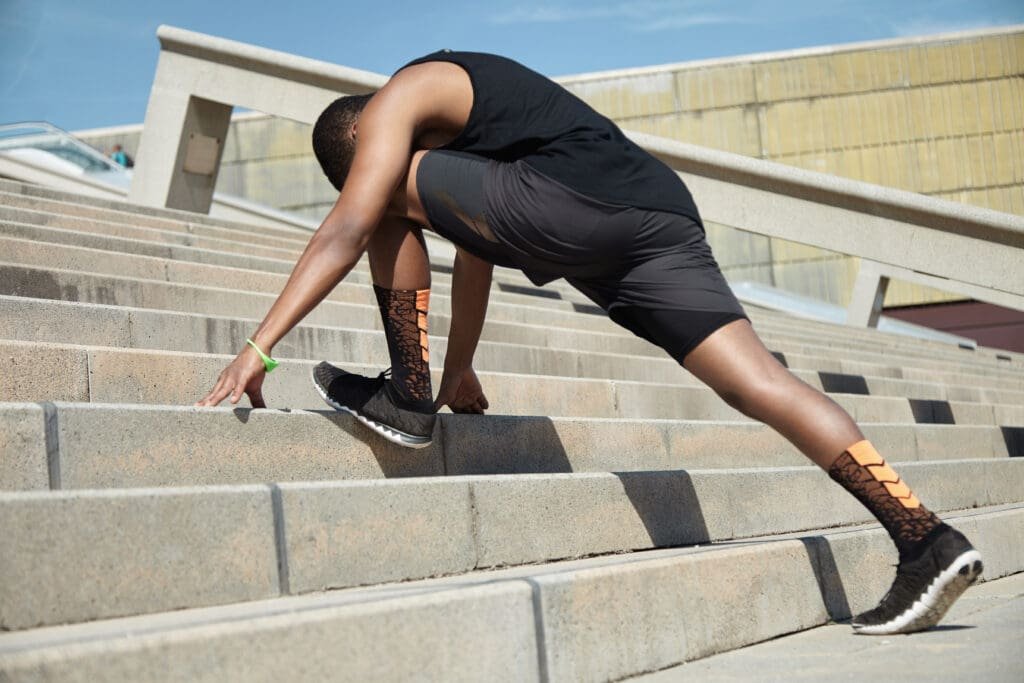 A man stretching.